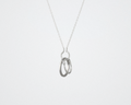 silver circle charm holding rings