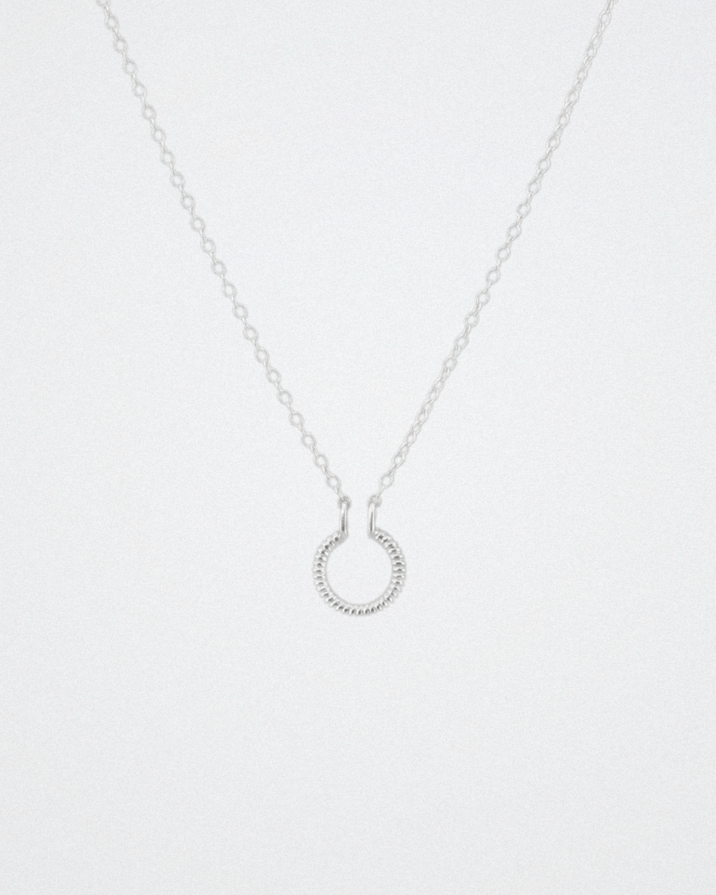 silver textured circle necklace