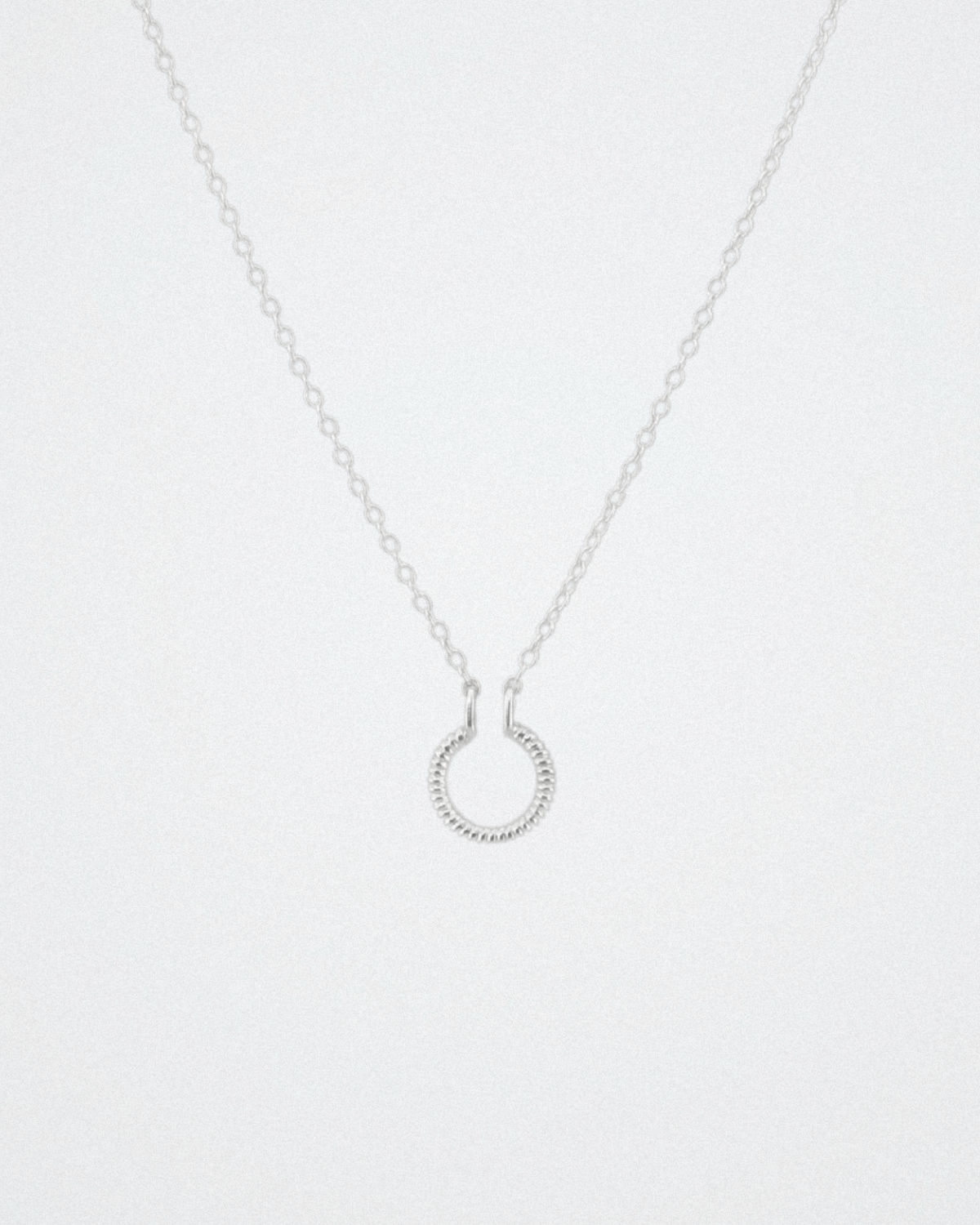 silver textured circle necklace